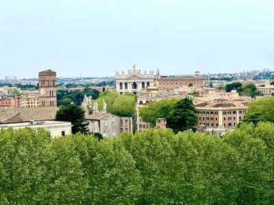 a view of a city with trees and buildings at Loft Pantanella Porta Magiore in Rome
