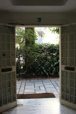 an open door to a courtyard with a garden at casa vacanze Borgo San Lazzaro in Rome
