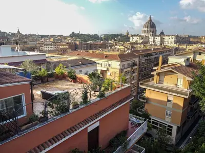 a view of a city with buildings at San Pietro in Vaticano Terrazza Giovy in Rome