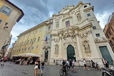 a group of people walking in front of a building at Pantheon Authentic and Modern Apartment in Rome