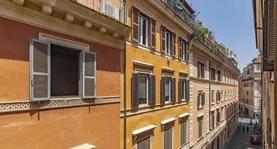 a group of buildings with windows and a street at Flaminia Luxury Hideaway in Rome