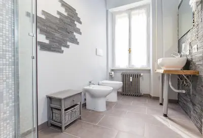 a bathroom with a toilet and a sink at Royal House Vaticano in Rome