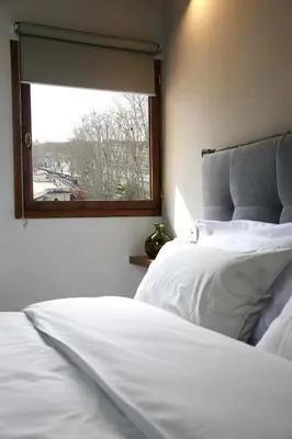 a bedroom with two white beds and a window at Rome, very central 2 bedrooms 4 beds in Rome