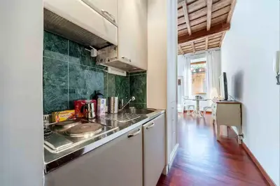 a kitchen with a sink and a counter top at Romantic in Rome