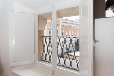 an open window with a view of a building at Appartamento Campo Marzio Lusso in Rome