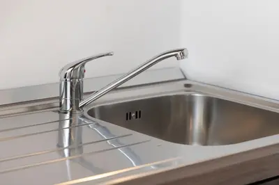 a stainless steel sink in a kitchen at Appartamento Campo Marzio Lusso in Rome