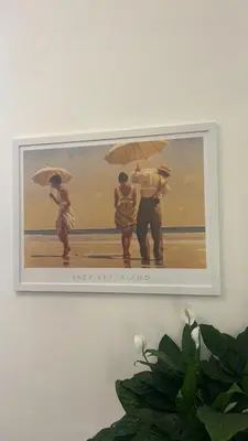 a picture of three people with umbrellas on a wall at Colosseo Promenade in Rome