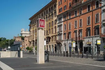 a msg sign on a pole in a city street at GuestHost - Bright Apartment in Metro San Giovanni in Rome