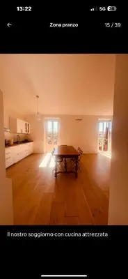 a bedroom with a large bed and a window at Interno 12 in Rome