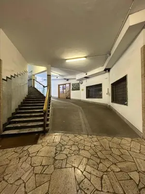 an empty building with stairs and a stair case at Ripa di Trastevere in Rome