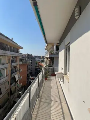 a balcony with a view of a city at Casa cozy e luminosa - Tiburtina in Rome