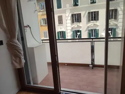 a view of a balcony from a window at Tanner's Apartment - Piramide in Rome