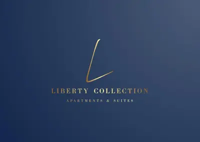 a gold letter k logo on a blue background at Bella Roma Luxury Accommodation, Vatican City - Liberty Collection in Rome
