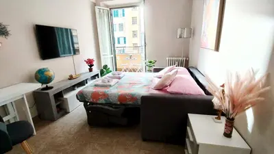 a small room with a bed and a couch at Metronia Maison in Rome
