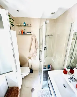 a bathroom with a shower and a toilet and a sink at Amazing Roma Vaticano in Rome