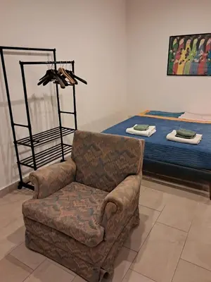 a living room with a couch and a bed at Vaticano in Love in Rome