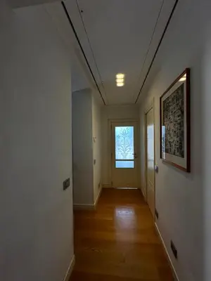 an empty hallway with a window in a house at Roman Dream Stay in Rome