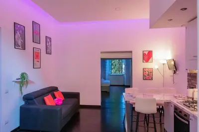 a living room with a couch and a table at Domus Aura in Rome