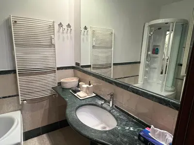 a bathroom with a sink and a mirror at Anna Stellarum in Rome