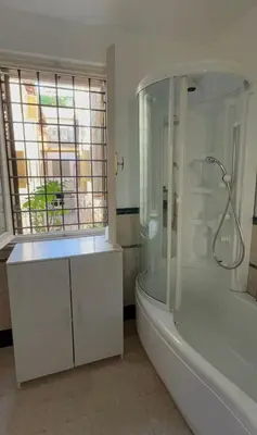 a bathroom with a shower and a tub and a sink at Anna Stellarum in Rome