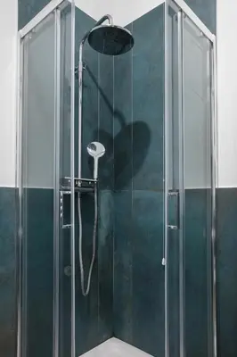 a shower with a glass door in a bathroom at Conca D'Oro Guest House - Elisabetta in Rome