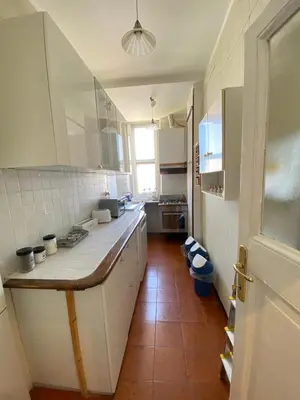 a kitchen with a counter top in a room at Casa Vacanze Domus 46 in Rome