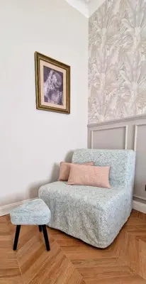 a living room with a couch and a table at LeChiaviDiCasa - Via Camilla in Rome