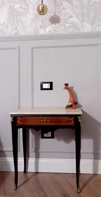 a desk with a lamp on top of it at LeChiaviDiCasa - Via Camilla in Rome