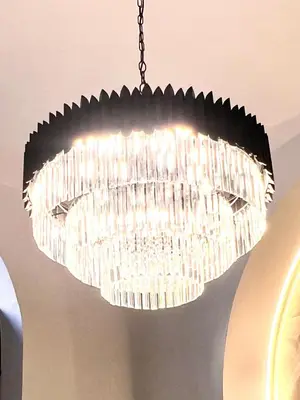 a large chandelier hanging from a ceiling at Romantic Rome Suite Aureliana in Rome