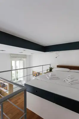 a bedroom with a large bed in a room at Casina Albani in Rome