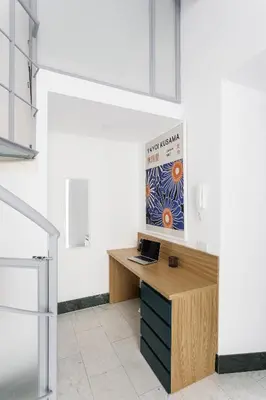 an office with a desk with a laptop on it at Casina Albani in Rome