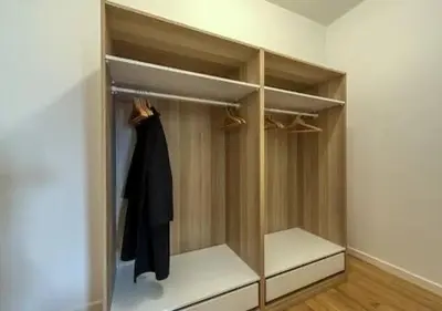 a closet with a robe hanging in it at Vittoriano Pantheon apartment in Rome