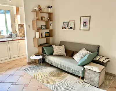 a living room with a couch and a table at Casa di Ross in Rome