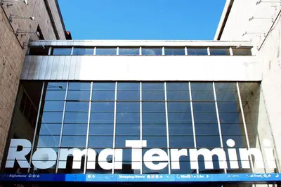 a building with a sign on the side of it at Rome Center Attic Penthouse in Rome