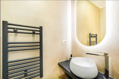a bathroom with a sink and a mirror at Vatican City Deluxe - Suite con bagno privato - Vaticano a piedi in Rome