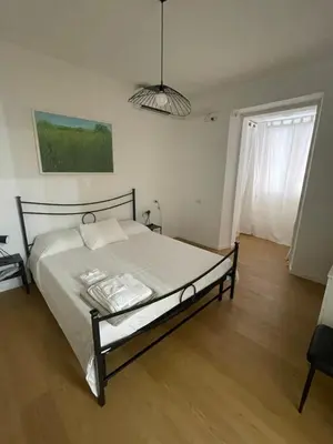 a bedroom with a bed in a room at San Lorenzo vivace e giovanile in Rome