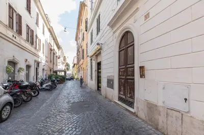 an alley with motorcycles parked on the side of a building at iFlat Peaceful & Charming Hideaway near Vatican in Rome