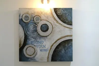 a close up of a washing machine with a picture at Town House 57 in Rome