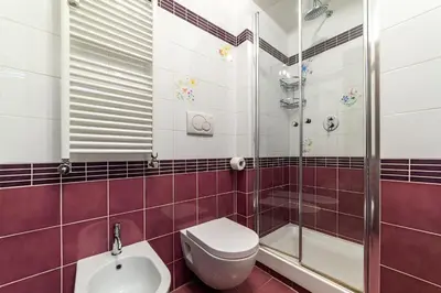a bathroom with a toilet and a shower and a sink at Leone IV - WelcomeToRhome in Rome