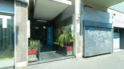 a front door of a building with plants in it at Casa vacanza Appartamento Irnerio vicino la Metro in Rome