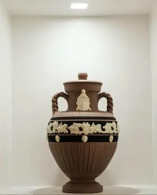 a vase sitting on a table in a room at Sunset Home in Rome