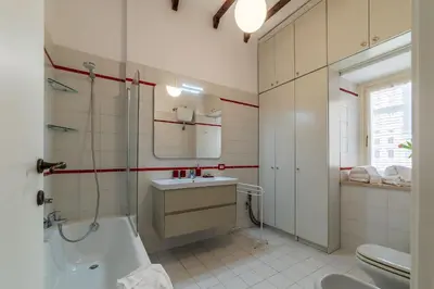 a bathroom with a sink and a shower and a toilet at Casa Fiori - WelcomeToRhome in Rome
