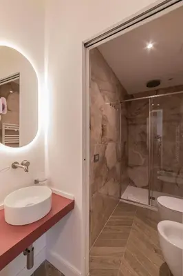 a bathroom with a shower and a sink at Victoria Rooms in Rome