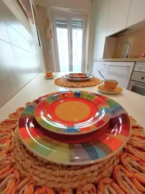 a colorful plate on a counter in a kitchen at Sophìa, City Retreat near Vatican in Rome