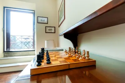 a chess board on a table in a room at Roma Colosseo, vista da sogno in Rome