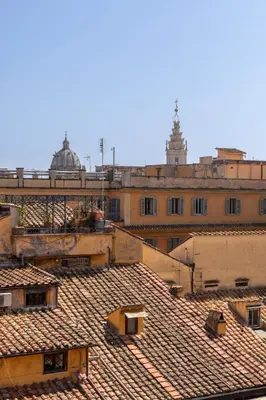 an overhead view of an old building with tile roofs at Celeste Retreat al Pantheon - Homkeey Apartments in Rome