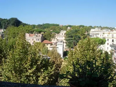 a view of a city with trees and buildings at Terrazza Trastevere Apartment in Rome