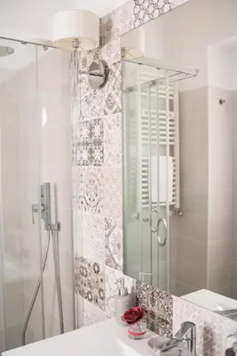 a bathroom with a shower and a sink and a mirror at VaticanRhome II in Rome