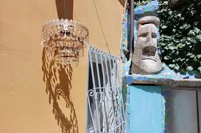 a chandelier hanging from the side of a door at Casa Gaudì in Rome