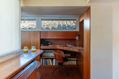 a home office with a desk and a chair at The Perfect View- Angel's Castle' in Rome